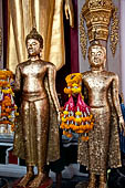 Thailand, Phra Pathom Chedi, the nation's largest pagoda in Nakorn Pathom. Buddha statue in one wiharn of the outer couryard.